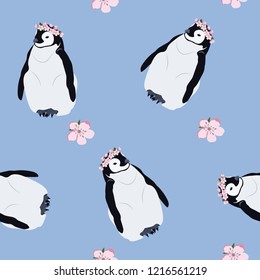 Seamless vector illustration with cute penguins on a blue background. For decoration of textiles, packaging, web design.