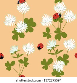 Seamless vector illustration with flowers, leaves of clover and ladybirds on a beige background. For decoration of textiles, packaging, web design.