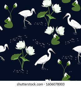 Seamless vector illustration with herons and lotus on a black background. For textile decoration, packaging, web design.