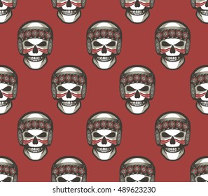 Seamless vector illustration of a human skull on a vinous background