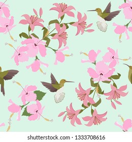 Seamless vector illustration with pink lilies, hibiscus and hummingbirds . For decorating textiles, packaging, web design.