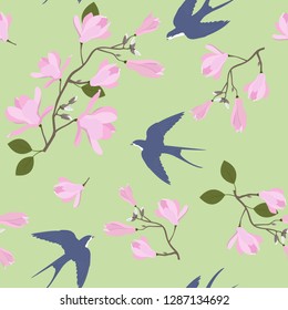 Seamless vector illustration with pink magnolia flowers and swallows on a green background. For decorating textiles, packaging, wallpaper.