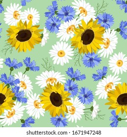 Seamless vector illustration with sunflowers, cornflowers and chamomile. For decorating textiles, packaging, wallpaper.