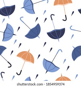 Seamless vector illustration with umbrellas on white background. For decorating textiles, packaging.