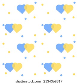 Seamless vector illustration with yellow-blue hearts.