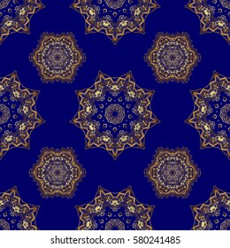 Seamless vector image of the elements in gold color on blue background. For wallpaper, presentation, design, textiles. Vector illustration.