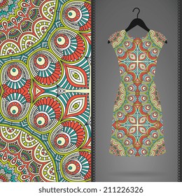 Seamless vector indian pattern. Dress on a hanger