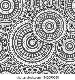 Seamless vector lace pattern. Vintage texture. Monochrome backdrop. Black and white daisies. Dark gray background. 