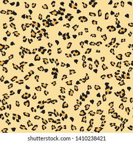 Seamless vector leopard pattern.  Trendy stylish wild leopard beige print. Animal print background for fabric, textile, design, advertising banner.
