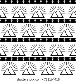 Seamless vector monochrome background with pyramid and ankh. Egyptian pattern in black and white colors
