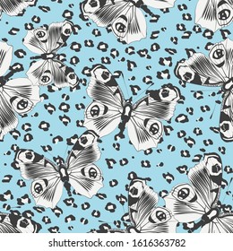 Seamless vector multicolor butterflies pattern. Butterfly on leopard print. Trendy animal motif wallpaper. Fashionable background for fabric, textile, design, banner, cover, web etc.