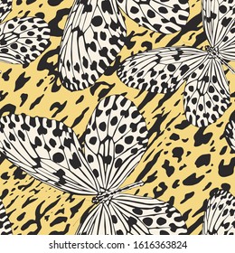 Seamless vector multicolor butterflies pattern. Butterfly on zebra leopard print. Trendy animal motif wallpaper. Fashionable background for fabric, textile, design, banner, cover.