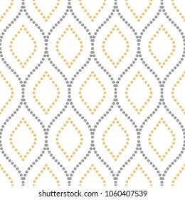 Seamless vector ornament. Modern background. Geometric modern gray and yellow dotted pattern
