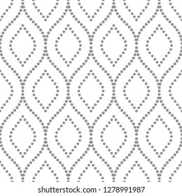 Seamless vector ornament. Modern background. Geometric modern dotted grey pattern
