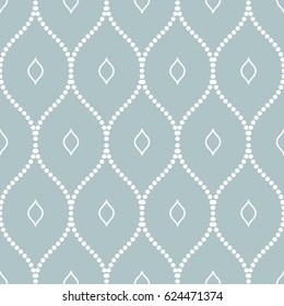 Seamless vector ornament. Modern dotted blue and white background. Geometric modern pattern