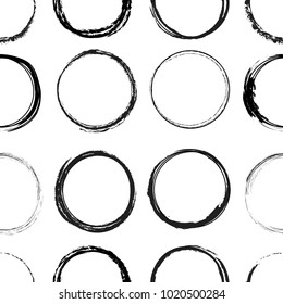 Seamless vector pattern with abstract black circles on white background