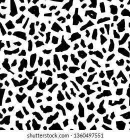 Seamless vector pattern of abstract black pieces, spots, silhouettes. Terrazzo style.