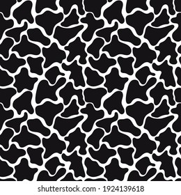 Seamless vector pattern with abstract black spots like a giraffe on a white background, a pattern for packaging, fabrics, banners