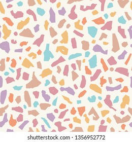 Seamless vector pattern of abstract colorful pieces, spots, terrazzo style.