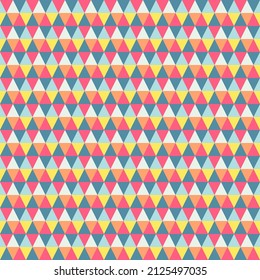 Seamless vector pattern. Abstract geometric background of triangles in in red, blue, orange, yellow tone. For use on wallpaper, fabric, packaging and more.