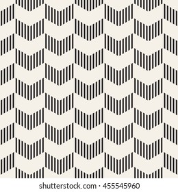 Seamless vector pattern. Abstract geometric background. Rhythmic zigzag structure. Monochrome stylish texture with chevron.