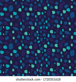Patrón vectorial de grava abstracta de piedra no direccional en colores azules. El diseño es perfecto para fondos, decoraciones, textiles, diseño de superficie y decoración exterior.