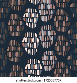 Patrón vectorial de las piedras de grava abstractas formadas en óvalos en colores pastel sobre fondo azul. Perfecto para el fondo, la decoración, el tejido, el diseño de la superficie y la decoración exterior.