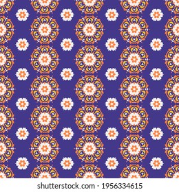 Seamless vector pattern with abstract symmetrical ornament. Background with ethnic oriental floral motif. Versatile textile design. 