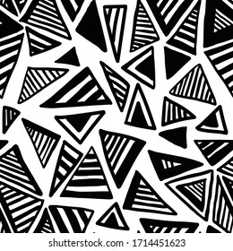 Seamless vector pattern with abstrat triangl shapes. Black and white  background with hand drawn symbols. Template for wrapping, decor, surface, cards, backgrounds, textile, print. 