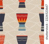 Seamless vector pattern with african djembe drums. Color drums background. Vector illustration.