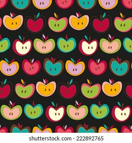 Seamless vector pattern with apples on a black background