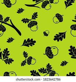 Seamless vector pattern with autumn leaves on colorful background. Oak leaf and acorn drawing pattern. silhouette drawing. 