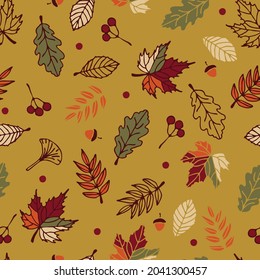 Seamless vector pattern with autumn leaves on green background. Simple seasonal wallpaper design. Decorative floral forest fashion textile.