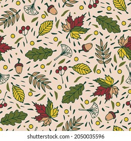 Seamless vector pattern with autumn leaves on beige background. Beautiful fall season wallpaper design. Decorative forest fashion textile texture.