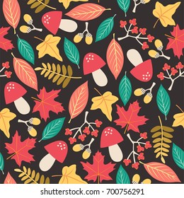 Seamless vector pattern with autumn leaves and other elements.