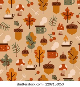 Seamless vector pattern with autumn vibe. Autumn things: yellow leaves, mushroom, candle, berry, tree brunch, acorn, travel cup. Fall background for textile, wallpapers, posters, etc.