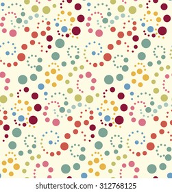Seamless vector pattern, background or texture with colorful yellow, orange, pink, green and blue polka dots. For web design, baby shower card, party, scrapbooks. Sweet autumn or thanksgiving colors.
