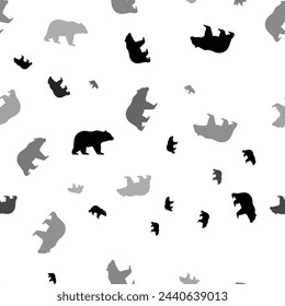 Seamless vector pattern with bear symbols, creating a creative monochrome background with rotated elements. Vector illustration on white background