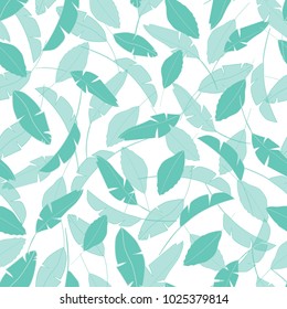 Seamless vector pattern with beautiful layered tropical leaves in green with a white background.