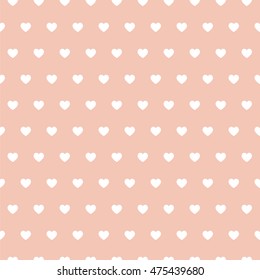 Seamless vector pattern with beige hearts on pastel background