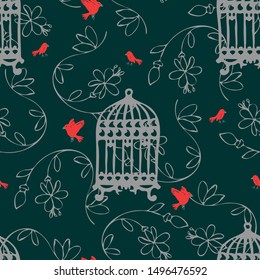 Seamless vector pattern with birdcage and pink birds on dark green background. Beautiful luxury floral wallpaper design. Romantic textile fashion.
