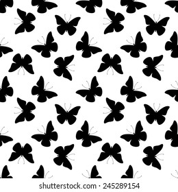 Seamless vector pattern with black butterflies isolated on white.