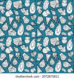 Seamless vector pattern of black and white small houses in the style of a doodle on a green background.