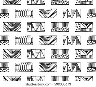 Seamless vector pattern. Black and white geometrical background with hand drawn decorative tribal elements. Print with ethnic, folk, traditional motifs. Graphic vector illustration.