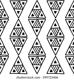 Seamless vector pattern. Black and white geometrical background with hand drawn decorative tribal elements. Print with ethnic, folk, traditional motifs. Graphic vector illustration.