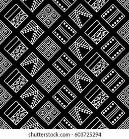 Seamless vector pattern. Black and white geometrical background with hand drawn decorative tribal elements. Print with ethnic, folk, traditional motifs. Graphic vector illustration.