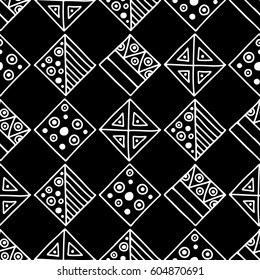 Seamless vector pattern. Black and white geometrical background with hand drawn decorative tribal elements. Print with ethnic, folk, traditional motifs. Graphic vector illustration.