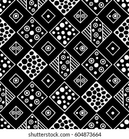 Seamless vector pattern. Black and white geometrical background with hand drawn decorative tribal elements. Print with ethnic, folk, traditional motifs. Graphic vector illustration.