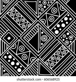 Seamless vector pattern. Black and white geometrical background with hand drawn decorative tribal elements. Print with ethnic, folk, traditional motifs. Graphic vector illustration.
