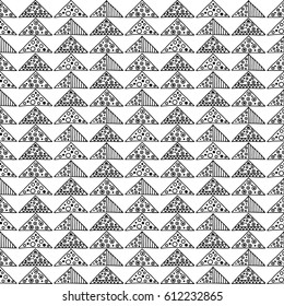 Seamless vector pattern. Black and white geometrical background with hand drawn decorative tribal elements. Print with ethnic, folk, traditional motifs. Graphic vector illustration.